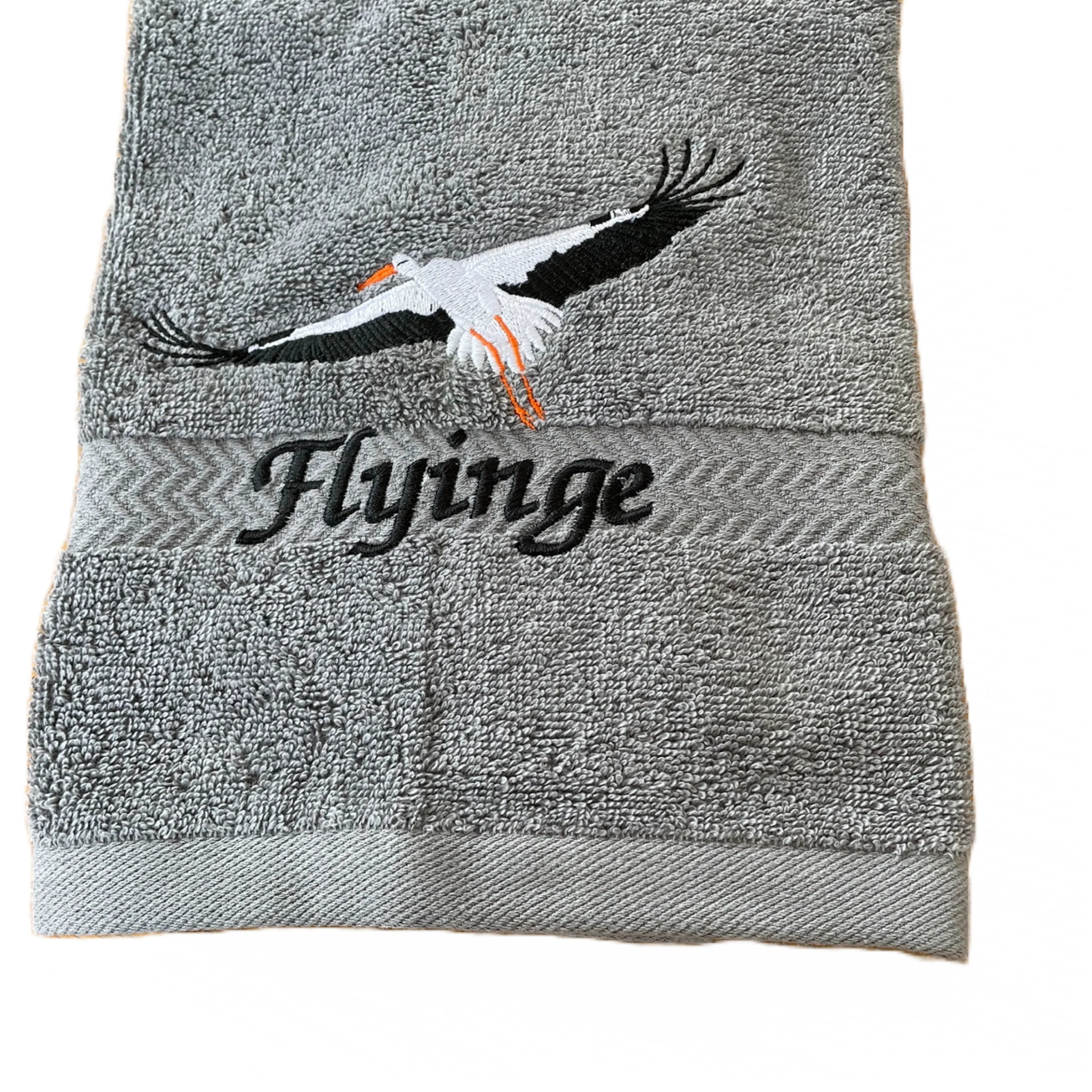 Frotté handduk med maskin broderat stork  motiv Trevlig present !
